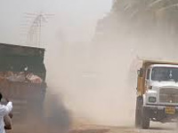 Dusty roads add air pollution woes in city