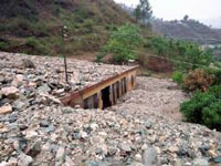 One dead, 3 injured in State landslide
