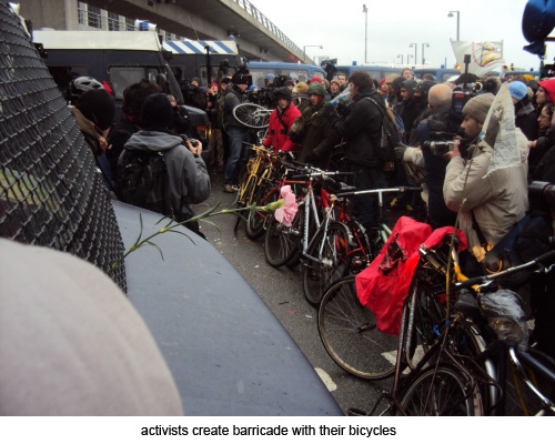 activists create barricade with their bicycles
